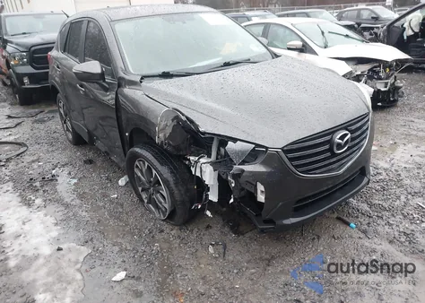 2016 Mazda Cx-5 Grand Touring z USA, uszkodzony, nr VIN JM3KE4DY4G0699992